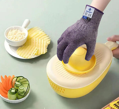 Pro Chef Cut Resistant Kitchen Gloves EN388 Level 5 in violet used for mandolin slicing, displayed with sliced vegetables.