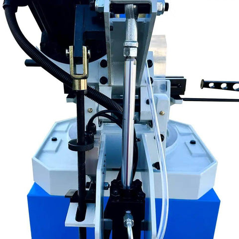 Close-up view of Tough As Nails Hydraulic Cold Cut Saw components showing two-speed drive and hydraulic system setup.