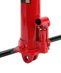 Red hydraulic long-ram floor jack side view showing clevis base and pump lever.