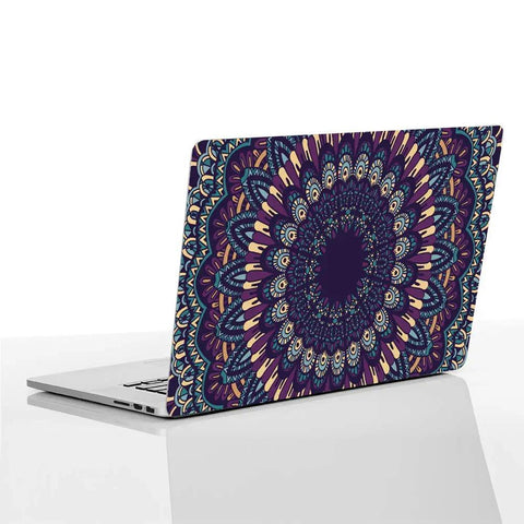 Laptop with mandala design skin, displaying vibrant colors, showcasing the artistic potential of personalized device decoration.
