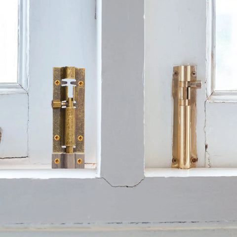 Heavy Duty Stainless Steel Rust Resistant Snap Lock For Door Gate Garage And Shed With Padlock Hole, installed on window.