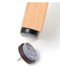 Adjustable Screw In Furniture Leg Levelers 24 Pack with brown rounded base, shown attached to wood leg and loose piece.