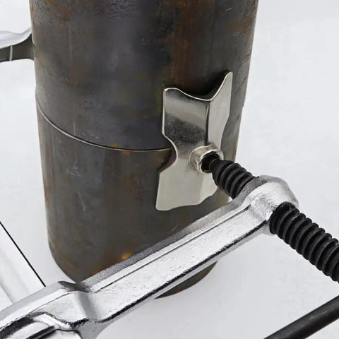 Heavy Duty Multi Functional Welding F Clamp For Pipe And Flat Plate Alignment With Quick Change Jaws securing a round pipe.