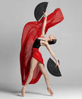 Black Hand Fan For Stage And Rave Dancers With Elaborate Design And Satisfying Snap Clack Go To Handheld Fan For Line Dancers 13 Inch Closed Size For A Bold Onstage Statement with dancer in red flowing attire