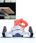 Heavy Duty Electric Tile Bevel And Chamfering Machine Featuring A Beefy 1200W Motor cutting through tile with precision and ease.