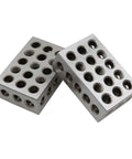 Two steel precision-ground 1x2x3 inch blocks with 23 threaded holes, matched pair