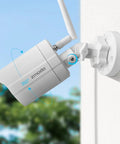 Outdoor camera from All In One Home Security Camera Bundle For Indoor And Outdoor Use 1080p HD Wireless WiFi Motion Detection mounted on wall