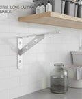 Heavy Duty Stainless Steel Shelf Bracket Wall Mount Built To Last For Garage Kitchen And Bath Storage Secure Stud Mount Level Shelving Support One Pack installed under wooden shelf on white tiled wall.