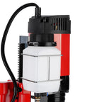 Close-up of the motor and coolant container of the Heavy Duty Magnetic Drill Press With 1550 Watt Power And 500 Rpm Speed.
