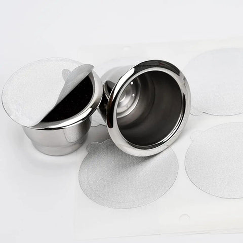 Reusable Espresso Capsules Refill Pods For Original Line Coffee Machines Stainless steel cups with aluminum foil lids.