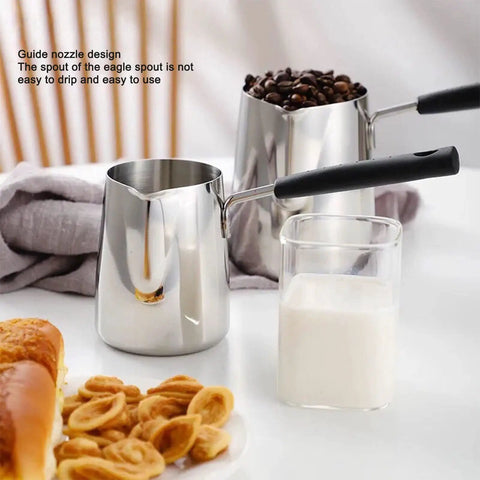 Milk Frothing Pitcher 20oz Stainless Steel No Drip Spout Long Handle Turkish Coffee Pot Frother For Espresso Machine Latte Art Cappuccino Foam Milk Jug 600ml Perfect For Home Barista Coffee Lovers on a kitchen counter