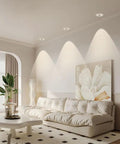 saditesdk 8-Pack 3.5 Inch Led Recessed Lighting Retrofit Downlight illuminating a modern living room with a large sofa.