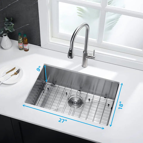 Top view of Drop In Kitchen Sink Single Bowl Stainless Steel 16 Gauge 304 Grade with sink strainer and grid, 27x18 inch, installed on white countertop