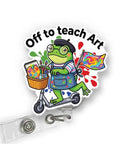 Off To Teach Art Teacher Badge Reel With Funny Frog Meme Design, Artist Badge Holder Featuring Paint Palette, Brushes, And Artsy Clip For Teachers, Professors, And Students, Great Gift For Art Class Lovers. 2x2 in ABS retractable badge reel with 24-in cord, frog on scooter