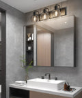 Three Light Matte Black Farmhouse Vanity Lighting Fixture With Clear Glass Globes For Bathroom Bath Lighting above mirror