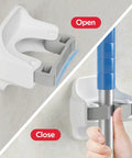 Reliahom white 3-pack wall-mounted broom and mop holder with self-adhesive anti-slip grips.