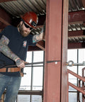 Worker using Ergonomic Round Connecting Bar 7/8 Inch Wide By 30 Inch Long With 15 Degree Angled Chisel, Tapered End.