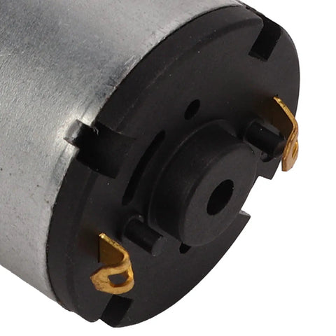 Close-up of Top Shelf DC Micro Air Pump And Mini Vacuum Module rated from 3.7 to 24 volts, showcasing metal and plastic casing.