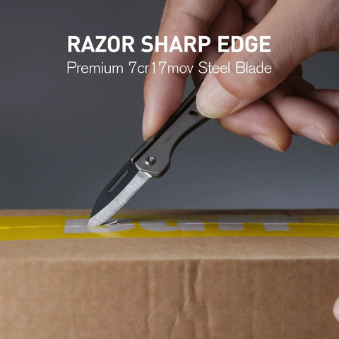 Titanium Mini Pocket Knife With Bottle Opener For EDC And Outdoor Gear cutting tape on a cardboard box