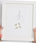 Heavy Duty Iron Picture Frame Backing Clips Featuring Quick Turn Button Fasteners And All Included Mounting Screws For Hanging Wall Photos Artwork Crafts Straight Up No Sweat, shown with a white frame and drawn hands.