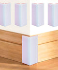 White Rubber Corner Protectors Self Adhesive Baseboard Guards on corner, thickened wall bumpers for home safety.
