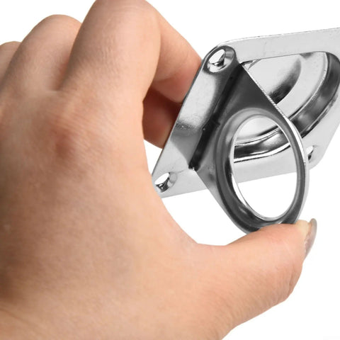 Hand holding Heavy Duty Stainless Steel Flush Mount D Rings Anchors Recessed Tie Downs for boat cargo, showing mounting detail.