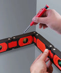 Person using Schimer Foldable Spirit Level Ruler with 4 Bubbles Magnetic Design High Accuracy for DIY Projects Home Decoration 600Mm