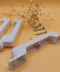 False Front Connector And Cabinet Clips Set For Four And A Half Inch Opening Drawers with clips and screws on display