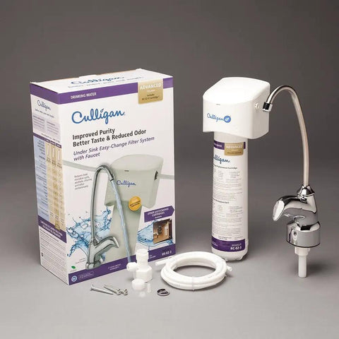 EZ-Change Under-Sink Water Filtration System with Dedicated Faucet, chrome finish, packaging and components displayed
