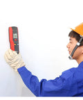 Person using Reliable Stud Finder And Wall Scanner Built For Dead Simple Detection Of Live Wires Pipes And Wood With Deep Scanning Range Pro Grade Tool.
