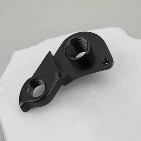 Derailleur Hanger M12x1.75 For Cannondale Mountain Bikes Replacement Thru Axle Hanger, black aluminum on white surface.