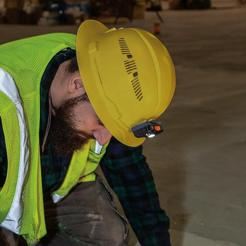 Worker wearing vented full brim hard hat with padded comfort and odor resistant self wicking sweatband for all day wear