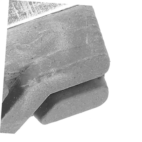 Close-up of Rock Solid Rear Disc Brake Pads for Mechanical Road and Gravel Bikes featuring durable material for easy installation.