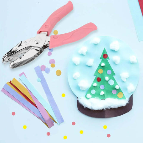 Handheld Paper Hole Punch Set With 1/16 Inch Small Circle And 1/8 Inch Medium Circle One Hole Punch Tool with pink grip on craft table