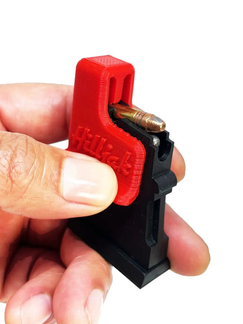 Two Pack Quickie Magazine Loader For CZ And Savage Rifle Magazines, ergonomic speed loader in use, close-up of red loader design