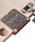 Precision 35mm Cabinet Hinge Drill Jig With Heavy Duty Locator Frame positioned on wood for exact hinge installation.