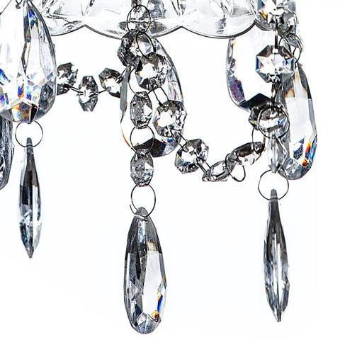 Close-up of acrylic crystals on Plug In Crystal Swag Chandelier With Three Lights, White Metal Frame, Clear Glass Stem