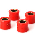 Built Tough Four Piece Rear Shock Absorbing Suspension Bushings Kit 10mm Rubber Vibration Dampeners In Fiery Red, close-up of rubber mounts.