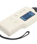 Pro Grade Handheld Digital Vibration Meter Tester Knocks Out Bearing Faults While Measuring Acceleration And Speed With Slick Probe. Side view with backlit screen.