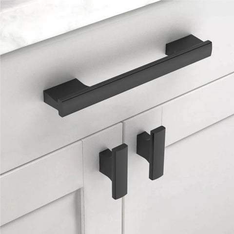 Close-up of 10 Pack 5 Inch Matte Black Cabinet Pulls for Cupboards and Drawers installed on white cabinet