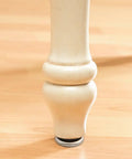 One Sixteenth Inch Round Screw In Leveling Glides For Wood Furniture Adjustable Heavy Duty Furniture Movers installed on wood leg