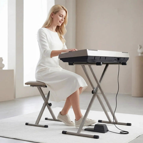 Woman playing keyboard with Universal Sustain Pedal For Keyboard With Polarity Switch And Quarter Inch Plug, in room setting