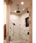 Bathroom shower with RL Series 5/6 Inch Recessed LED Retrofit Downlight With White Baffle Trim, 600 Lumens, installed in ceiling