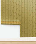 Top Tier Beige Floral Stripe Metallic Wallpaper With Glowing Gold Accents And Major Textured Fibrous Finish Clean Aesthetic Wall Covering Eco Certified Pvc Free Made In Usa For Quick Room Glow Ups hanging on a wall.