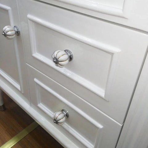 White cabinet with porcelain chrome pumpkin knobs from 10 Pieces White Ceramic Round Pumpkin Knobs For Cabinets And Furniture