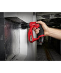 Professional Installation Drill And Driver Featuring All Steel Three Eighth Inch Chuck And Multiple Hex Adapters And Lightweight Cordless Power Tool With Heavy Duty Belt Clip And Spacious Contractor Bag For Tough Trade Work in use, drilling into a wall.
