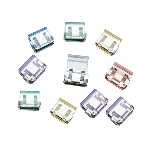 Slick Invisible Pants Leg Shortening Clips For Tailored Trouser Hems And Window Screen Fixes Set Of Ten assorted alloy clips.