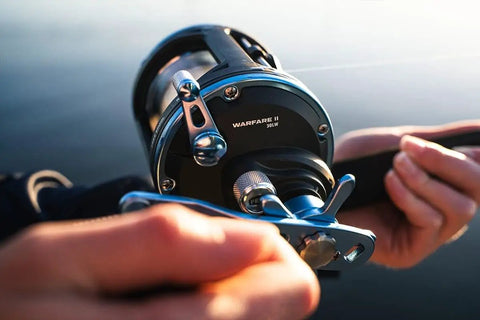 Tough As Nails Saltwater Level Wind Fishing Reel Size Thirty featuring graphite housing and brass main gear in use.