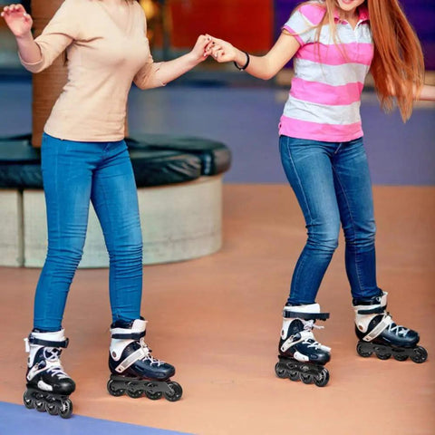 Two people indoor skating using inline skates with 8 Pack Inline Skate Wheels Set 70Mm 72Mm 76Mm 82A 84A With Bearings ABEC