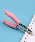 Handy Metal Handled Paper Punch With 6mm Circle Hole, 6.3 Inch Length, Rubber Grip, shown punching paper on blue background
